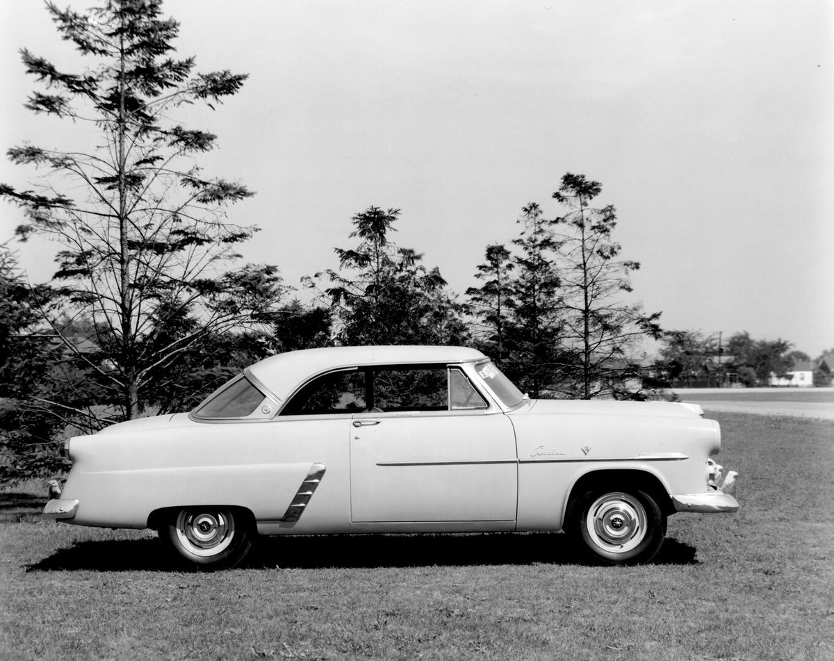 This archival image documents the 1952 Meteor Crestline Coupe side view with scenic trees AR-2007-5 and is preserved in the Ford Heritage Vault as part of Ford Motor Company's historic photographic archive. Free for personal, non-commercial use. F...