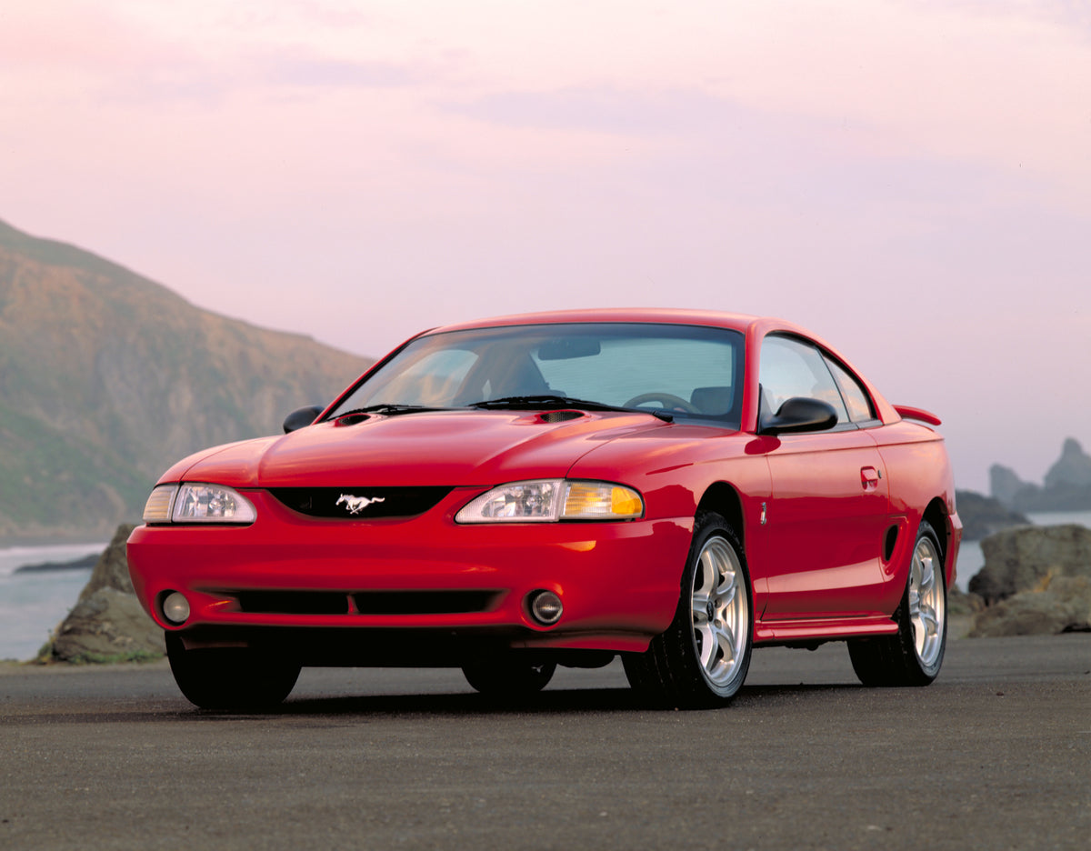 This archival image documents the 1998 Ford Mustang Cobra GT coupe and is preserved in the Ford Heritage Vault as part of Ford Motor Company's historic photographic archive. Free for personal, non-commercial use. Ford Heritage Vault reference AR-2...