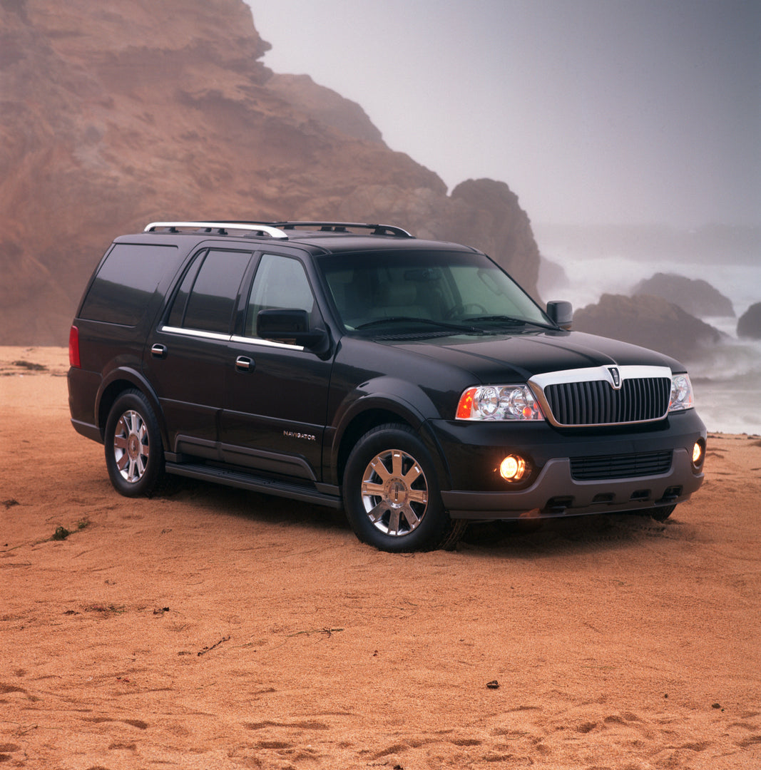 This archival image documents the 2003 Lincoln Navigator on the beach and is preserved in the Ford Heritage Vault as part of Ford Motor Company's historic photographic archive. Free for personal, non-commercial use. Ford Heritage Vault reference A...
