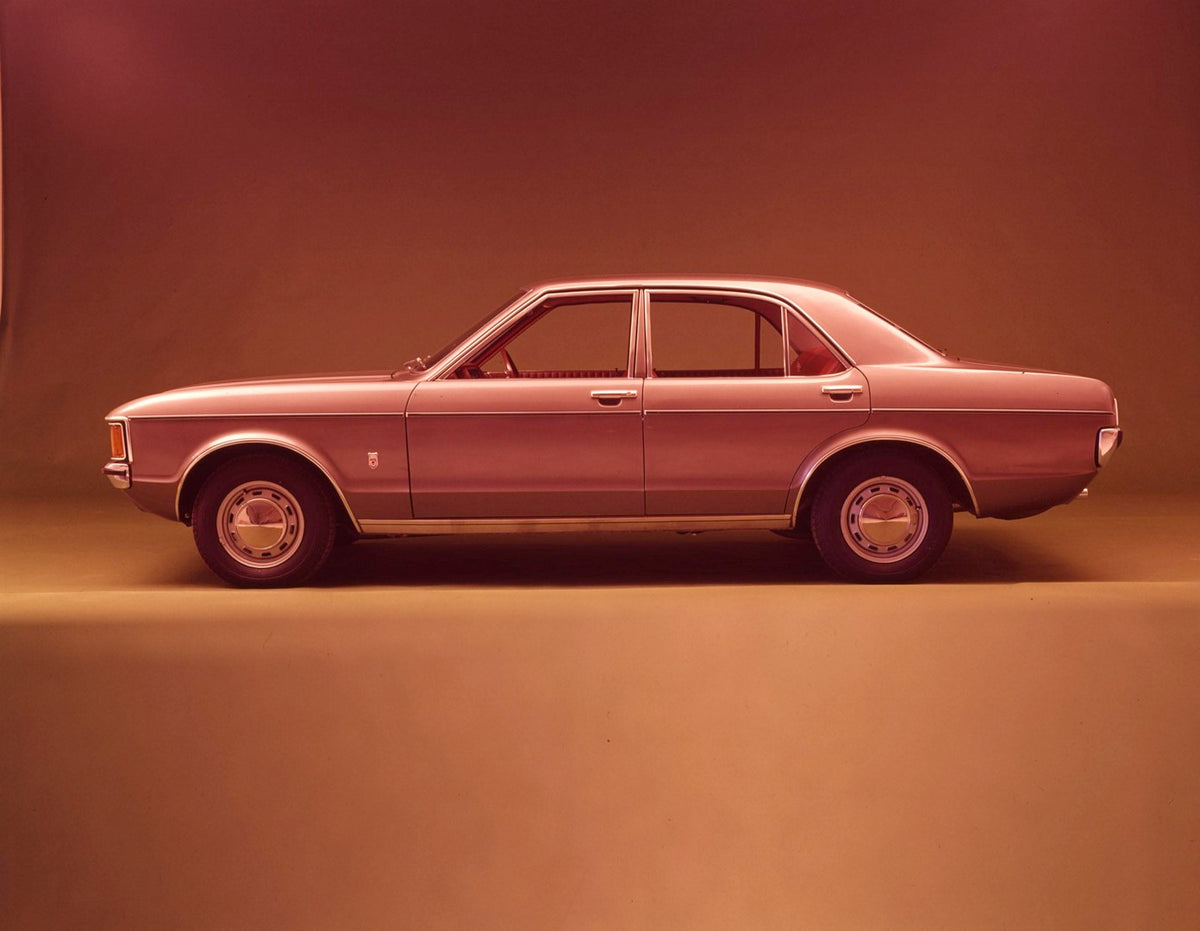 This archival image documents the 1972 Ford Granada Mark I side view in studio and is preserved in the Ford Heritage Vault as part of Ford Motor Company's historic photographic archive. Free for personal, non-commercial use. Ford Heritage Vault re...