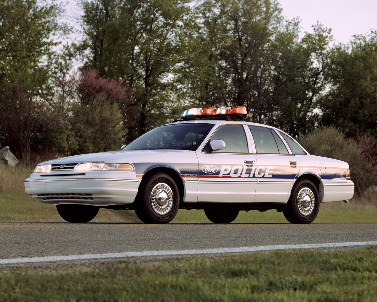 This archival image documents the 1995 Ford Crown Victoria police car and is preserved in the Ford Heritage Vault as part of Ford Motor Company's historic photographic archive. Free for personal, non-commercial use. Ford Heritage Vault reference A...