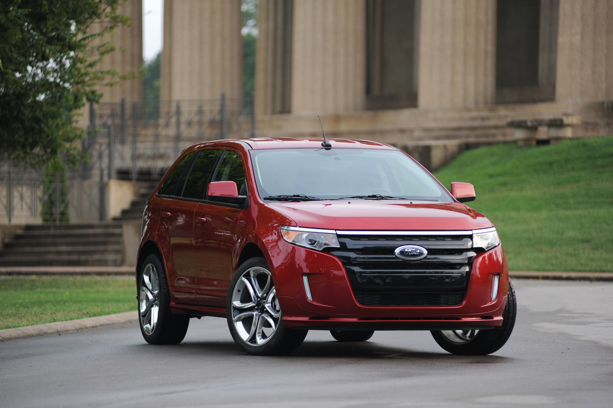 This archival image documents the 2010 Ford Edge in front of columns and is preserved in the Ford Heritage Vault as part of Ford Motor Company's historic photographic archive. Free for personal, non-commercial use. Ford Heritage Vault reference AR...