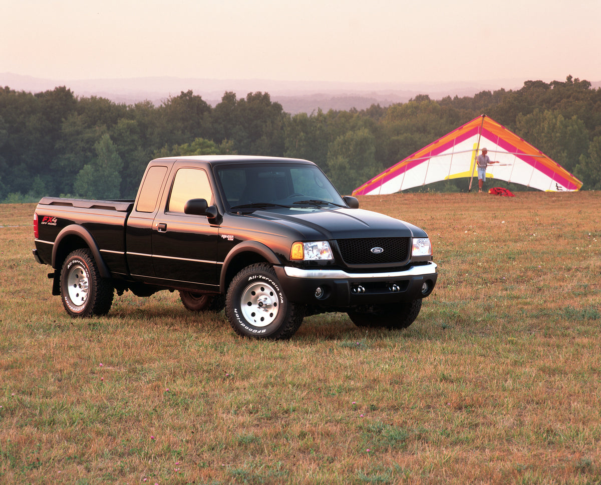 This archival image documents the 2002 Ford Ranger XLT FX4 pickup truck scenic and is preserved in the Ford Heritage Vault as part of Ford Motor Company's historic photographic archive. Free for personal, non-commercial use. Ford Heritage Vault re...