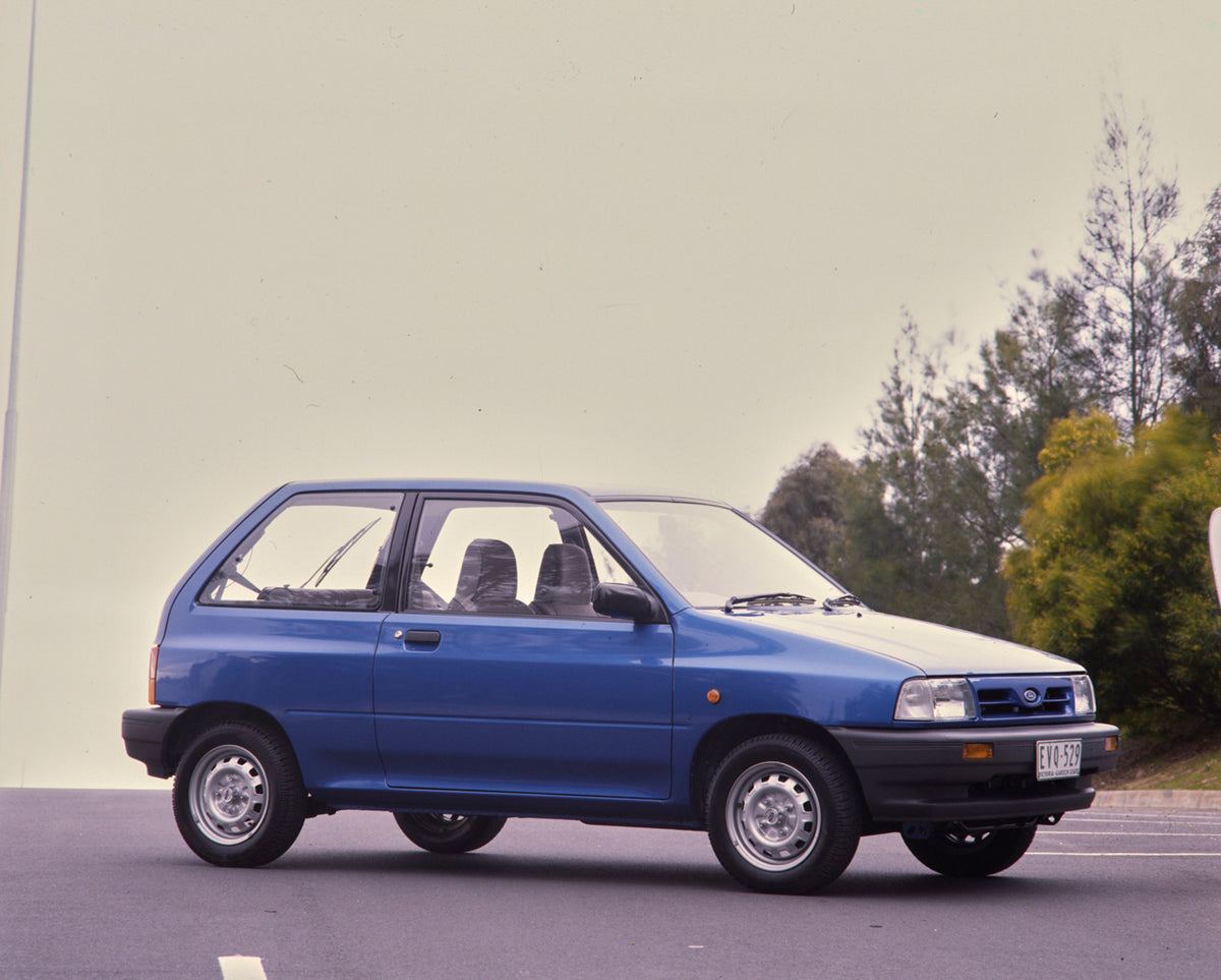 This archival image documents the 1991 Ford WA Festiva Driver Side Front End View on Country Road FAP-2011-3 and is preserved in the Ford Heritage Vault as part of Ford Motor Company's historic photographic archive. Free for personal, non-commerci...