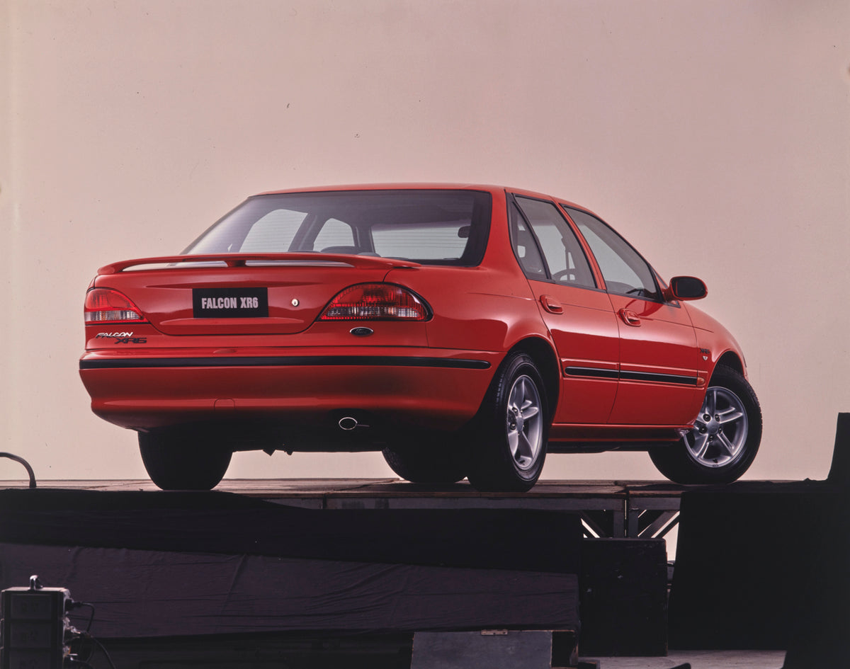 This archival image documents the 1994 Ford ED Falcon XR6 Sedan Driver Side Rear End View in Studio Fap-2011-3 and is preserved in the Ford Heritage Vault as part of Ford Motor Company's historic photographic archive. Free for personal, non-commer...