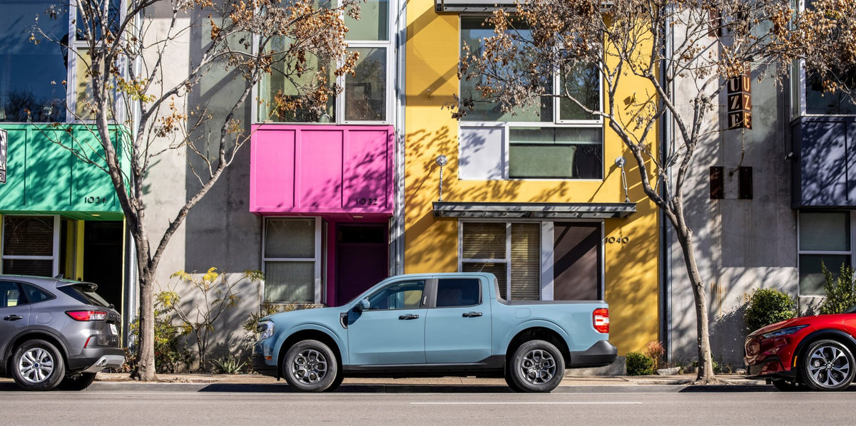This archival image documents the 2022 Ford Maverick Hybrid XLT side with on scenic street with other Ford vehicles and is preserved in the Ford Heritage Vault as part of Ford Motor Company's historic photographic archive. Free for personal, non-c...