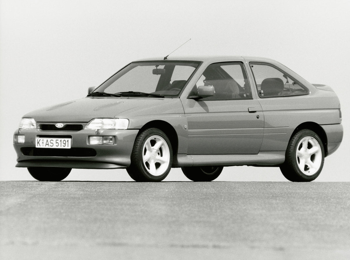 This archival image documents the 1993 Ford Escort Mark V RS Cosworth on pavement and is preserved in the Ford Heritage Vault as part of Ford Motor Company's historic photographic archive. Free for personal, non-commercial use. Ford Heritage Vault...