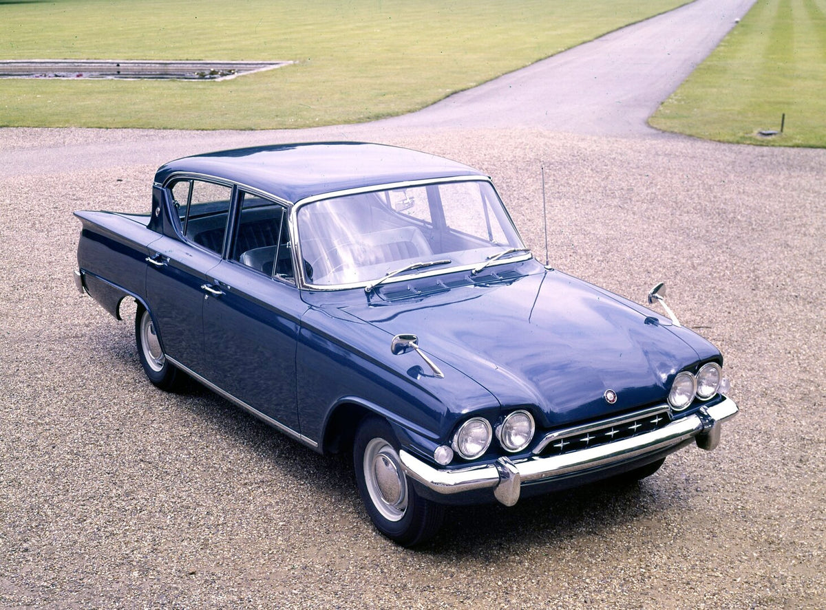 This archival image documents the 1961 Ford Consul Classic Duchess of Kent aerial view on gravel road and is preserved in the Ford Heritage Vault as part of Ford Motor Company's historic photographic archive. Free for personal, non-commercial use....