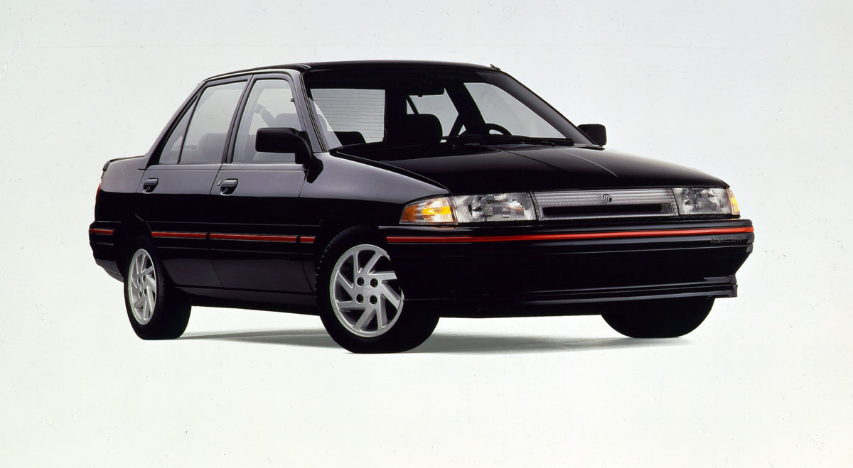 This archival image documents the 1992 Mercury Tracer front angle CN63012-1 and is preserved in the Ford Heritage Vault as part of Ford Motor Company's historic photographic archive. Free for personal, non-commercial use. Ford Heritage Vault refer...