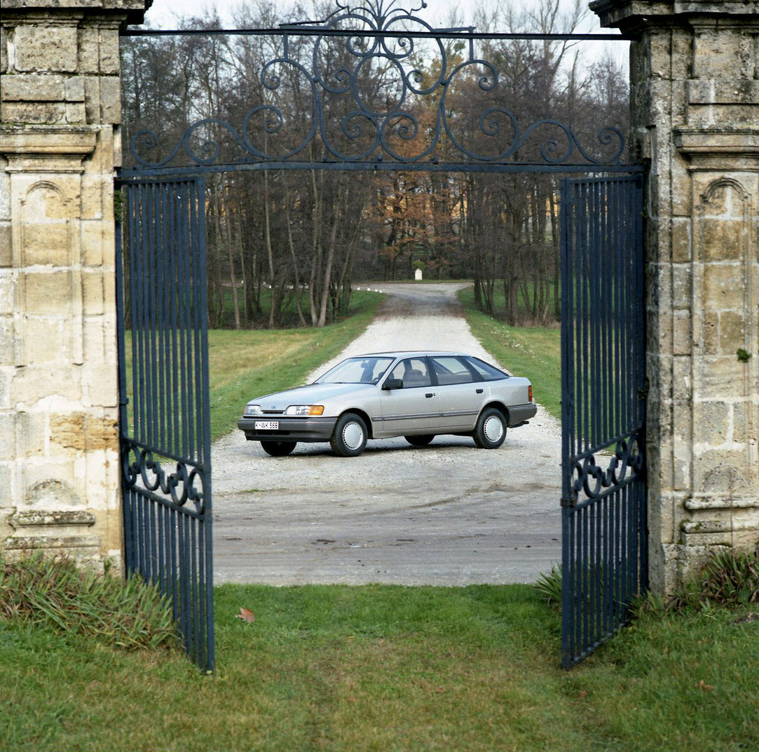 This archival image documents the 1984 Ford Scorpio Mark I LHD with scenic gate in Bordeaux and is preserved in the Ford Heritage Vault as part of Ford Motor Company's historic photographic archive. Free for personal, non-commercial use. Ford Heri...