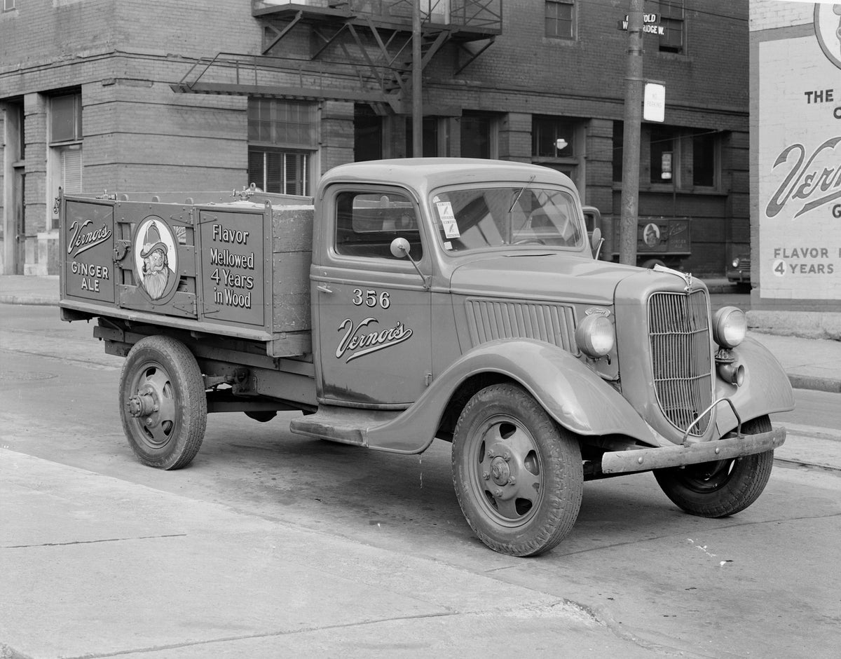 This archival image documents the 1936 Ford stake bed Vernors delivery truck and is preserved in the Ford Heritage Vault as part of Ford Motor Company's historic photographic archive. Free for personal, non-commercial use. Ford Heritage Vault refe...
