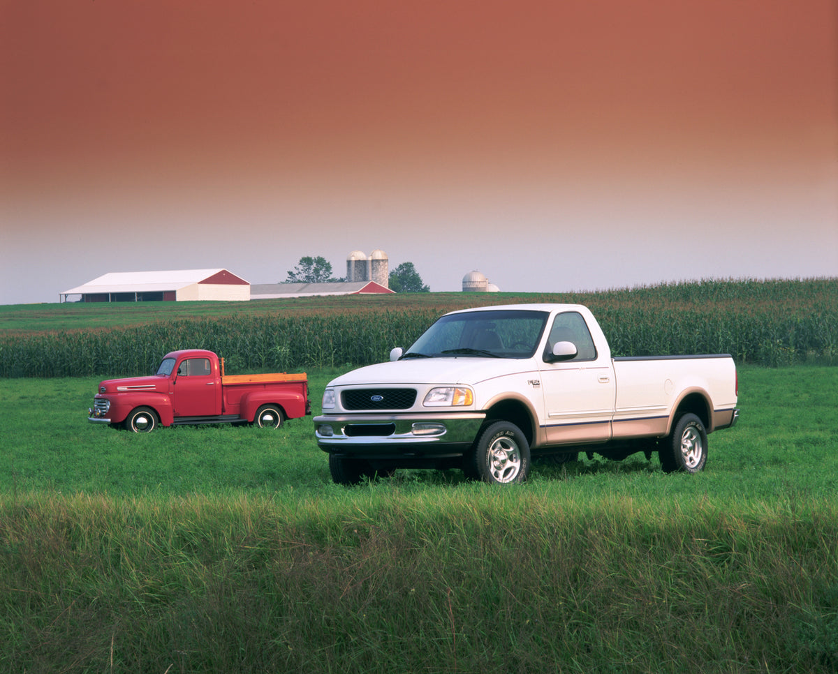 This archival image documents the 1998 Ford F-150 Lariat and 1948 F-1 pickup trucks and is preserved in the Ford Heritage Vault as part of Ford Motor Company's historic photographic archive. Free for personal, non-commercial use. Ford Heritage Vau...