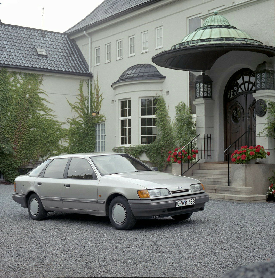This archival image documents the 1984 Ford Scorpio Mark I CL in scenic driveway in Norway and is preserved in the Ford Heritage Vault as part of Ford Motor Company's historic photographic archive. Free for personal, non-commercial use. Ford Herit...