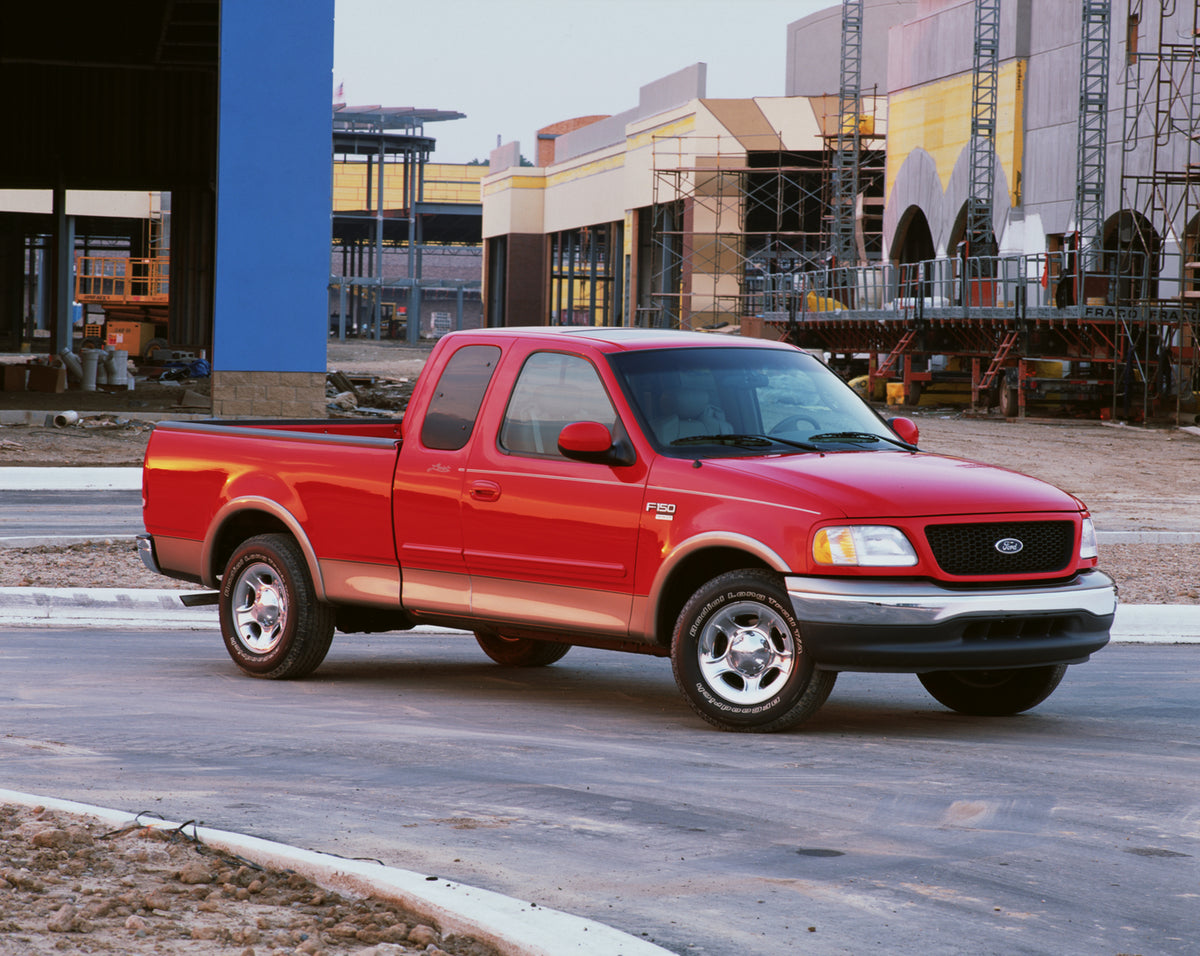 This archival image documents the 2002 Ford F-150 pickup truck on construction site and is preserved in the Ford Heritage Vault as part of Ford Motor Company's historic photographic archive. Free for personal, non-commercial use. Ford Heritage Vau...