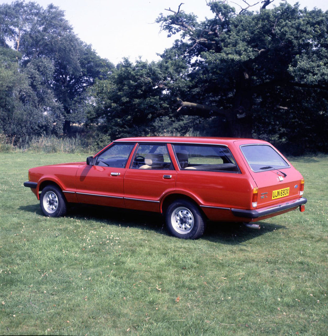 This archival image documents the 1981 Ford Cortina Estate 1.6L rear view in scenic field with trees and is preserved in the Ford Heritage Vault as part of Ford Motor Company's historic photographic archive. Free for personal, non-commercial use. ...