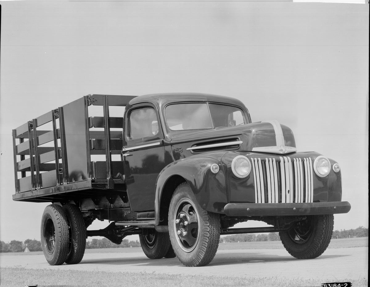 This archival image documents the 1946 Ford stake truck and is preserved in the Ford Heritage Vault as part of Ford Motor Company's historic photographic archive. Free for personal, non-commercial use. Ford Heritage Vault reference AR-2008-8.1.4.1...