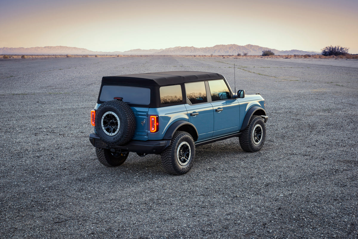 This archival image documents the 2021 Ford Bronco rear view in scenic desert MS and is preserved in the Ford Heritage Vault as part of Ford Motor Company's historic photographic archive. Free for personal, non-commercial use. Ford Heritage Vault ...