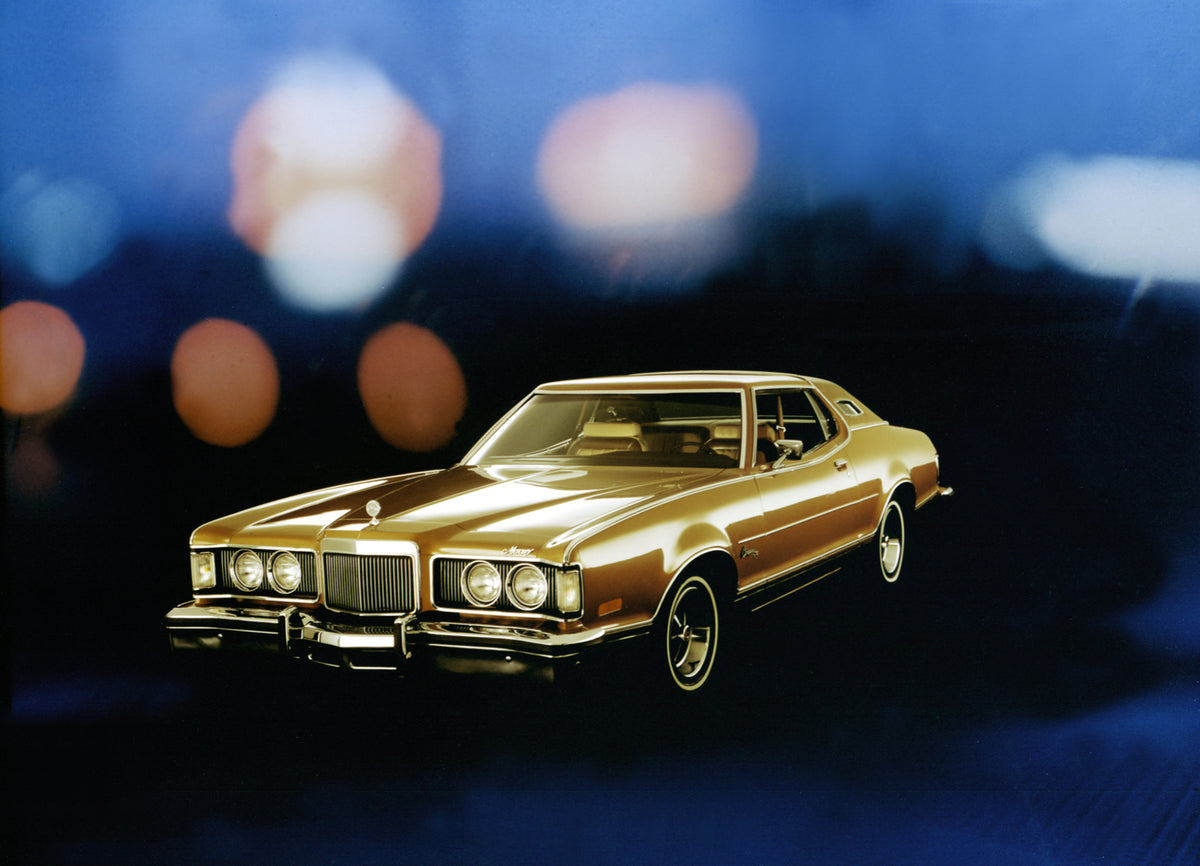 This archival image documents the 1975 Mercury Cougar with Blue background and Blurred Lights and is preserved in the Ford Heritage Vault as part of Ford Motor Company's historic photographic archive. Free for personal, non-commercial use. Ford He...