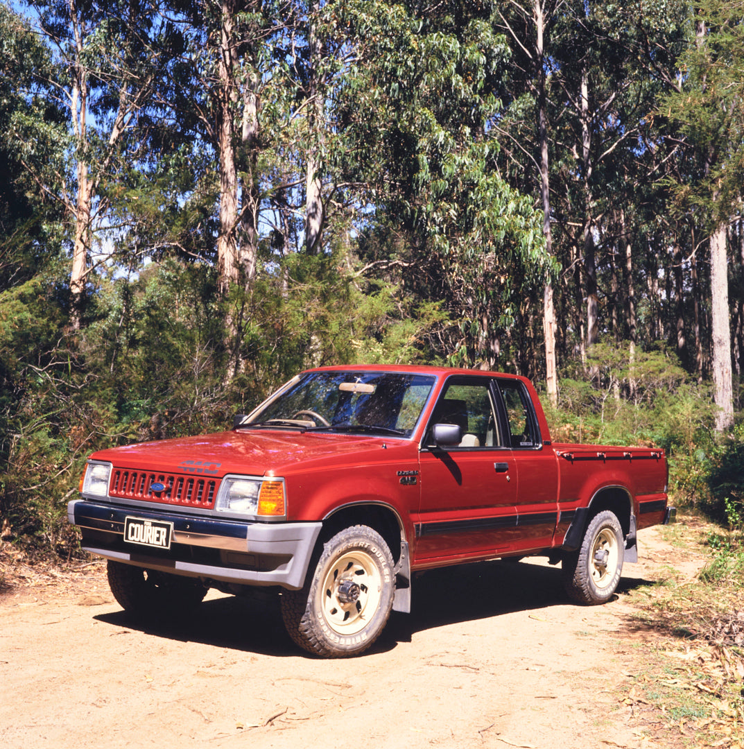 This archival image documents the 1984 Ford Courier Pickup Truck Passenger Side Front End View in Wooded Area FAP-2011-3 and is preserved in the Ford Heritage Vault as part of Ford Motor Company's historic photographic archive. Free for personal, ...