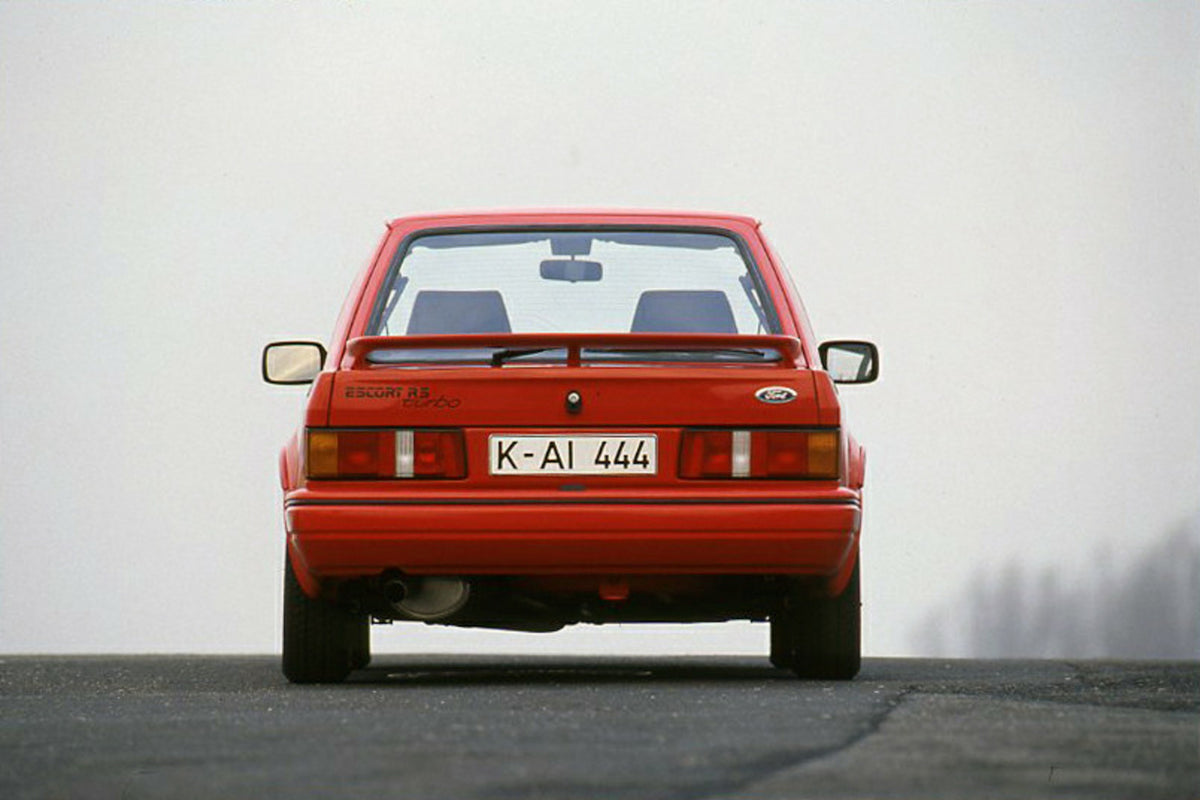 This archival image documents the 1986 Ford Escort Mark IV Turbo LHD rear view on road and is preserved in the Ford Heritage Vault as part of Ford Motor Company's historic photographic archive. Free for personal, non-commercial use. Ford Heritage ...