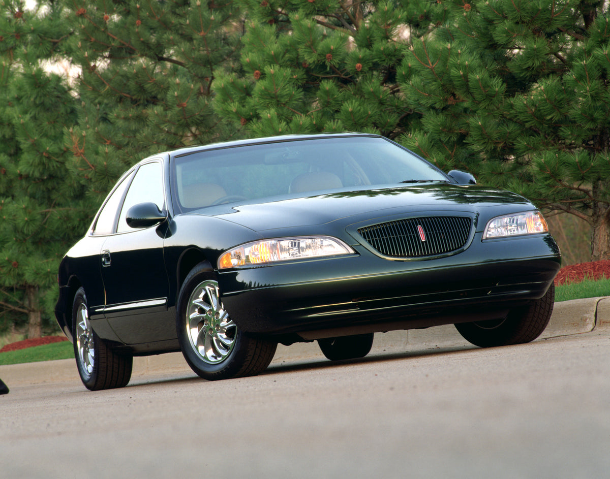 This archival image documents the 1998 Lincoln Mark VIII and is preserved in the Ford Heritage Vault as part of Ford Motor Company's historic photographic archive. Free for personal, non-commercial use. Ford Heritage Vault reference AR-2008-8.1.1....