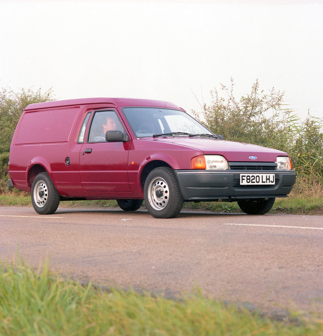 This archival image documents the 1988 Ford Escort Mark IV 6/8 Counterweight Van for Motor Show on scenic road and is preserved in the Ford Heritage Vault as part of Ford Motor Company's historic photographic archive. Free for personal, non-commer...