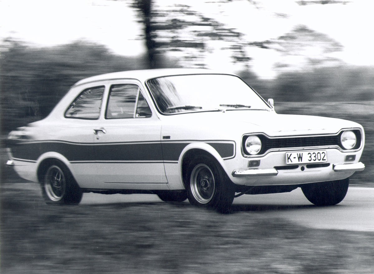 This archival image documents the 1973 Ford Escort Mark I RS2000 action shot on scenic road and is preserved in the Ford Heritage Vault as part of Ford Motor Company's historic photographic archive. Free for personal, non-commercial use. Ford Heri...