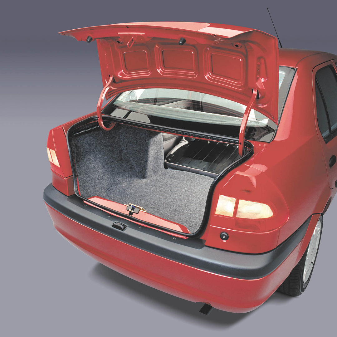 This archival image documents the 2003 Ford Ikon rear closeup with open trunk in studio MS3418 and is preserved in the Ford Heritage Vault as part of Ford Motor Company's historic photographic archive. Free for personal, non-commercial use. Ford H...