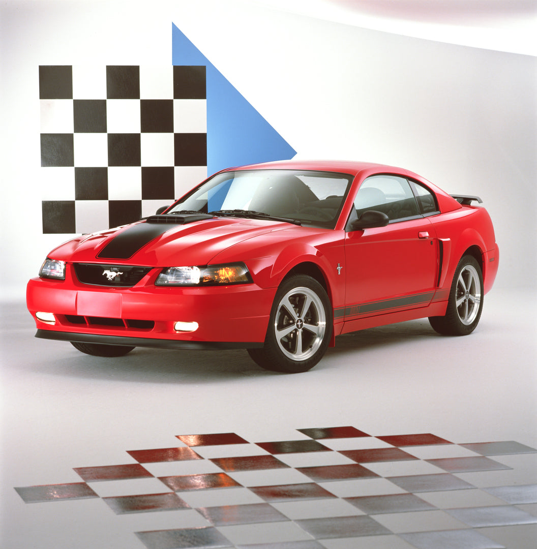 This archival image documents the 2003 Ford Mustang Mach 1 coupe and is preserved in the Ford Heritage Vault as part of Ford Motor Company's historic photographic archive. Free for personal, non-commercial use. Ford Heritage Vault reference AR-200...