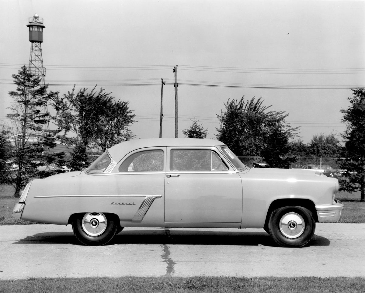 This archival image documents the 1952 Monarch Coupe side view on scenic road AR-2007-5 and is preserved in the Ford Heritage Vault as part of Ford Motor Company's historic photographic archive. Free for personal, non-commercial use. Ford Heritage...