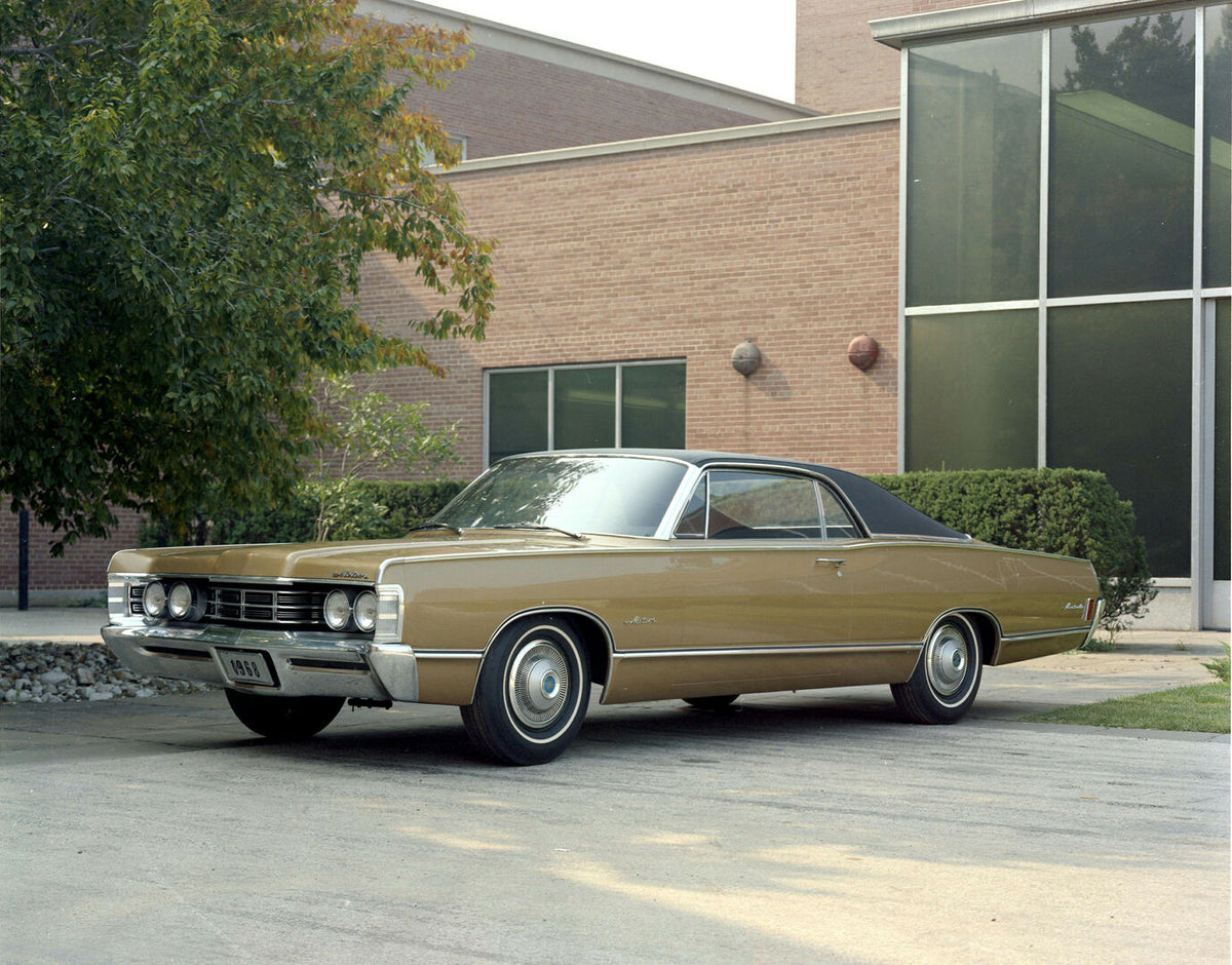 This archival image documents the 1968 Meteor Coupe in front of building with trees AR-2007-5 and is preserved in the Ford Heritage Vault as part of Ford Motor Company's historic photographic archive. Free for personal, non-commercial use. Ford He...