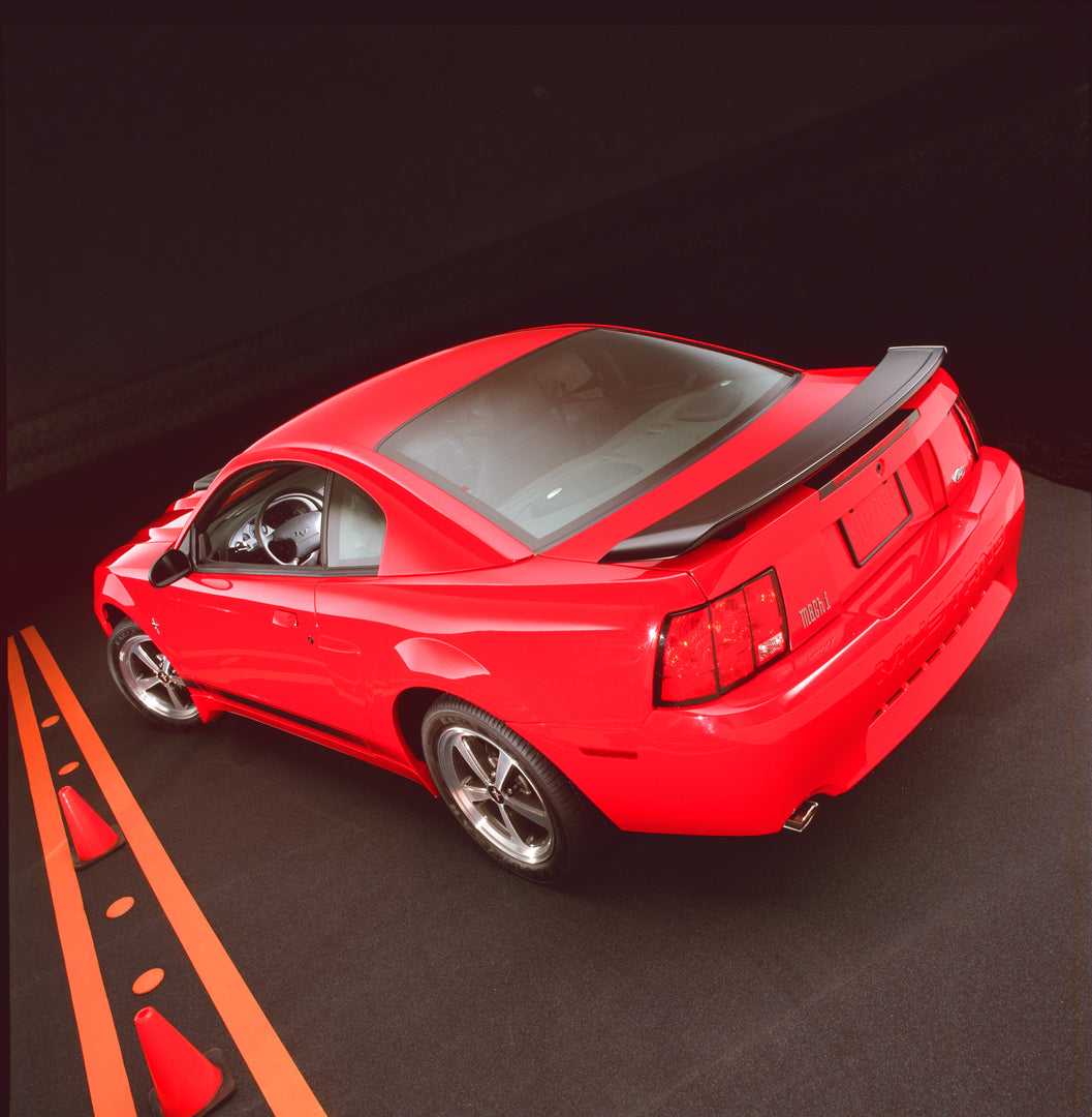 This archival image documents the 2003 Ford Mustang Mach 1 coupe and is preserved in the Ford Heritage Vault as part of Ford Motor Company's historic photographic archive. Free for personal, non-commercial use. Ford Heritage Vault reference AR-200...