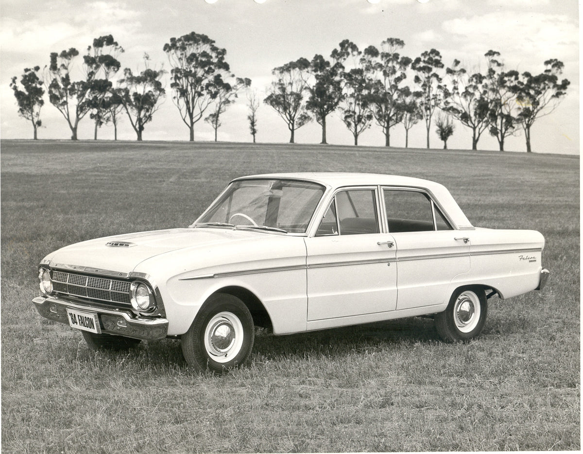 This archival image documents the 1964 Ford XM Falcon in scenic field with trees and is preserved in the Ford Heritage Vault as part of Ford Motor Company's historic photographic archive. Free for personal, non-commercial use. Ford Heritage Vault ...