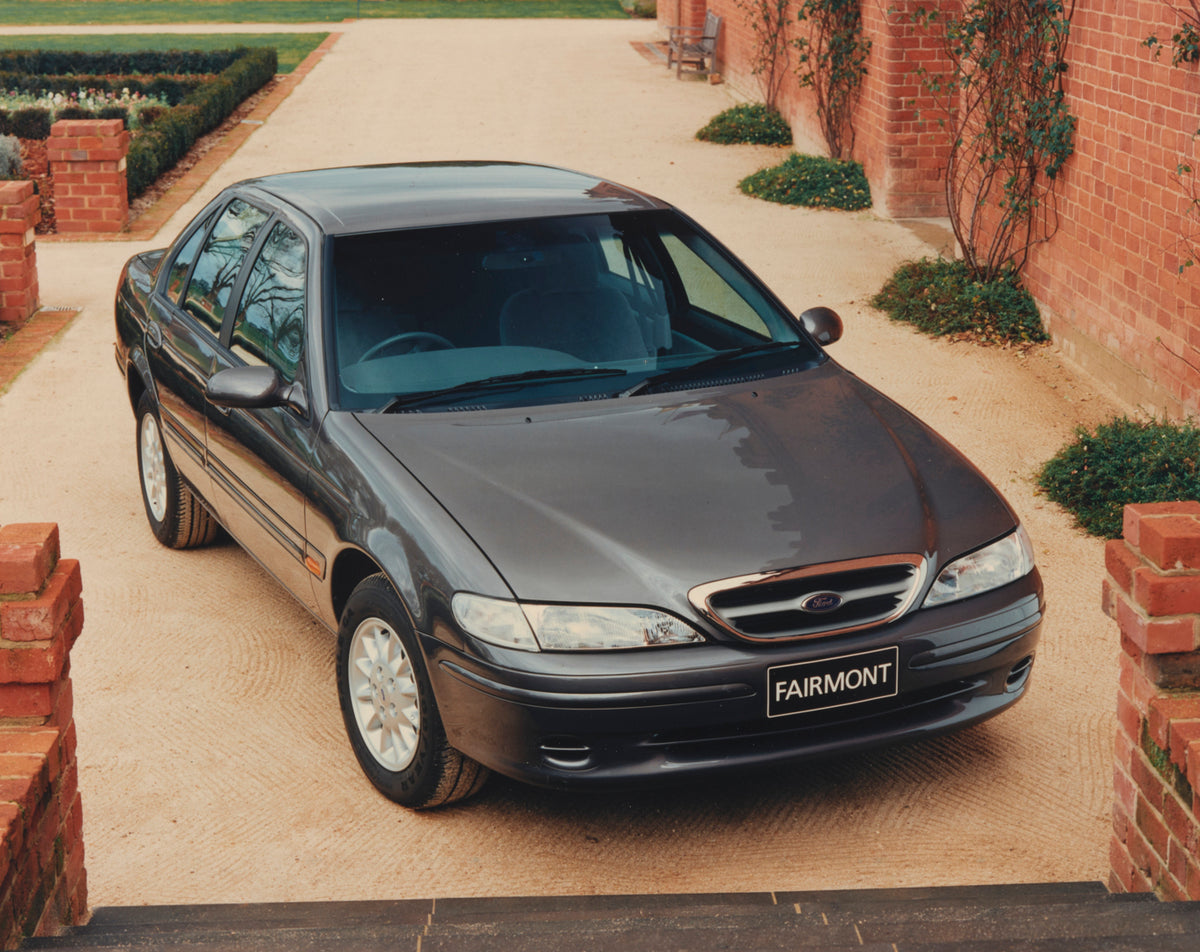 This archival image documents the 1996 Ford EL Falcon Fairmont Sedan Front End View in Driveway FAP-2011-3 and is preserved in the Ford Heritage Vault as part of Ford Motor Company's historic photographic archive. Free for personal, non-commercial...