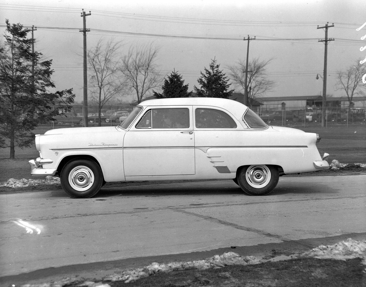 This archival image documents the 1954 Meteor Niagara Coupe side view on scenic road with trees AR-2007-5 and is preserved in the Ford Heritage Vault as part of Ford Motor Company's historic photographic archive. Free for personal, non-commercial ...