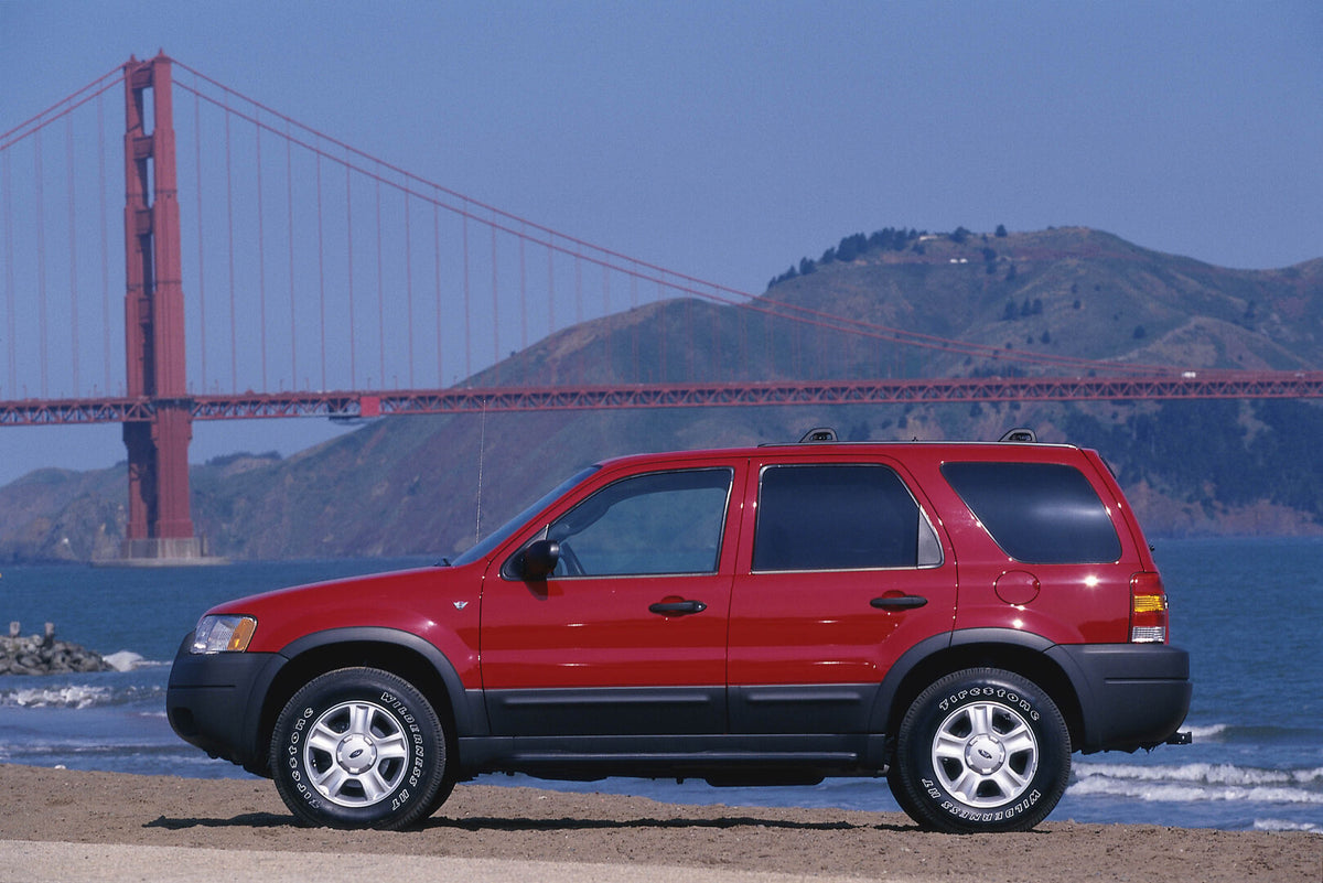 This archival image documents the 2003 Ford Maverick side view with scenic bridge and is preserved in the Ford Heritage Vault as part of Ford Motor Company's historic photographic archive. Free for personal, non-commercial use. Ford Heritage Vault...