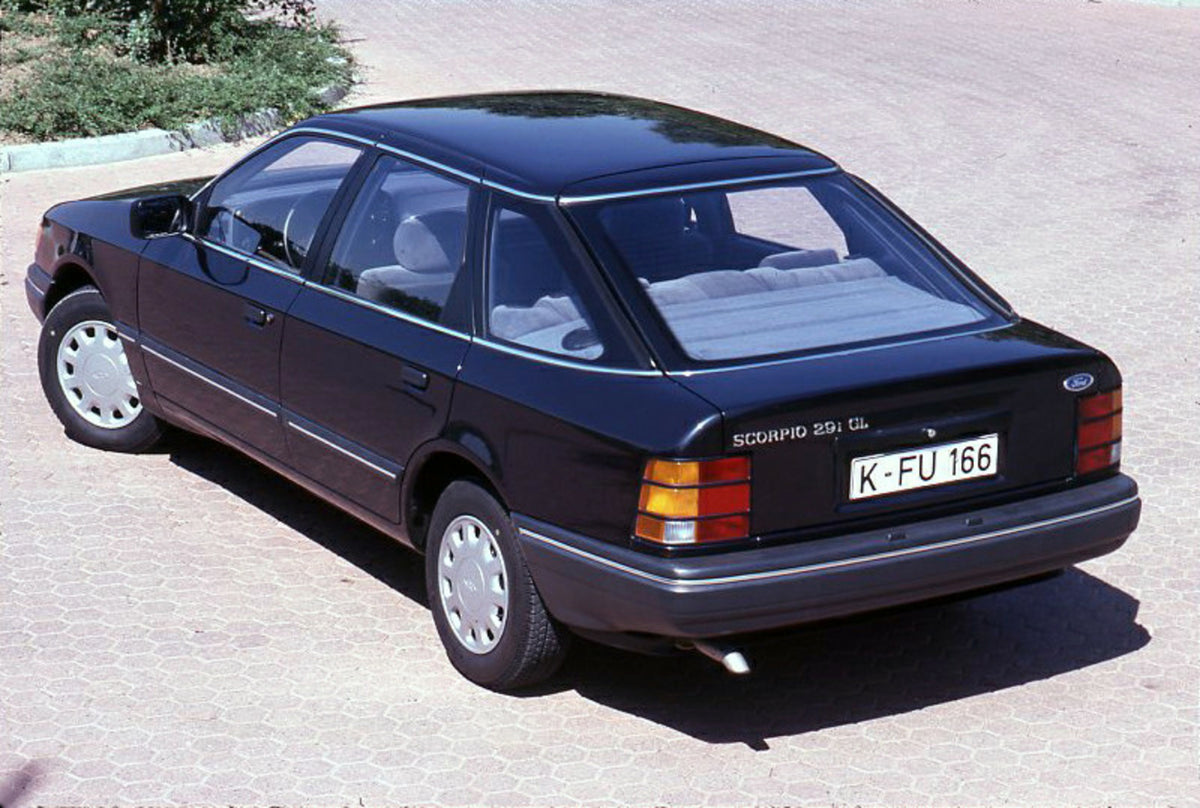 This archival image documents the 1986 Ford Scorpio Mark I 2.9i GL rear view on brick road and is preserved in the Ford Heritage Vault as part of Ford Motor Company's historic photographic archive. Free for personal, non-commercial use. Ford Herit...
