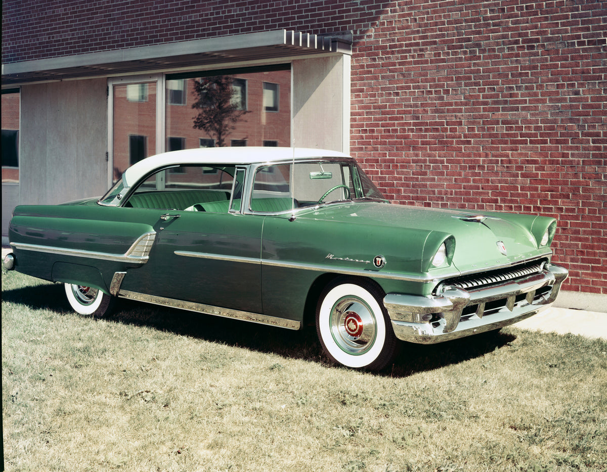This archival image documents the 1955 Mercury Monterey hardtop in Front of Building with Side Angle and is preserved in the Ford Heritage Vault as part of Ford Motor Company's historic photographic archive. Free for personal, non-commercial use. ...