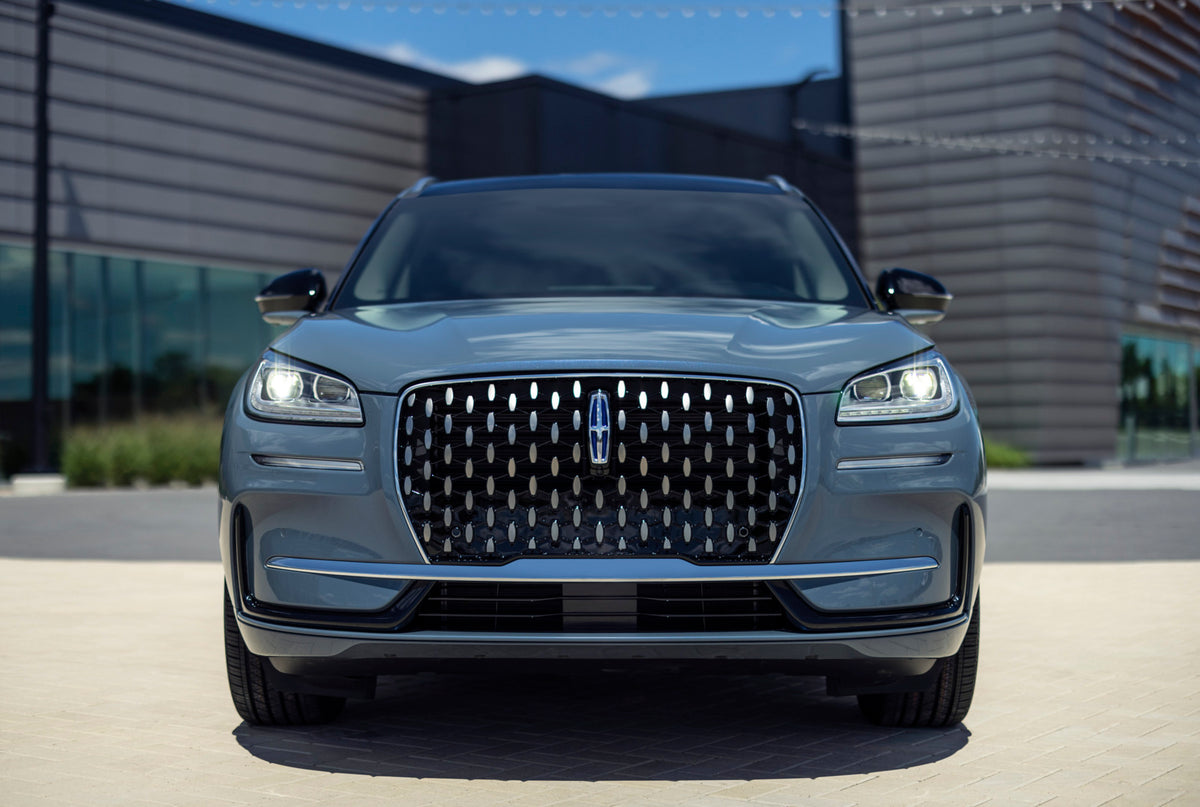 This archival image documents the 2023 Lincoln Corsair Grand Touring front view in front of building and is preserved in the Ford Heritage Vault as part of Ford Motor Company's historic photographic archive. Free for personal, non-commercial use. ...