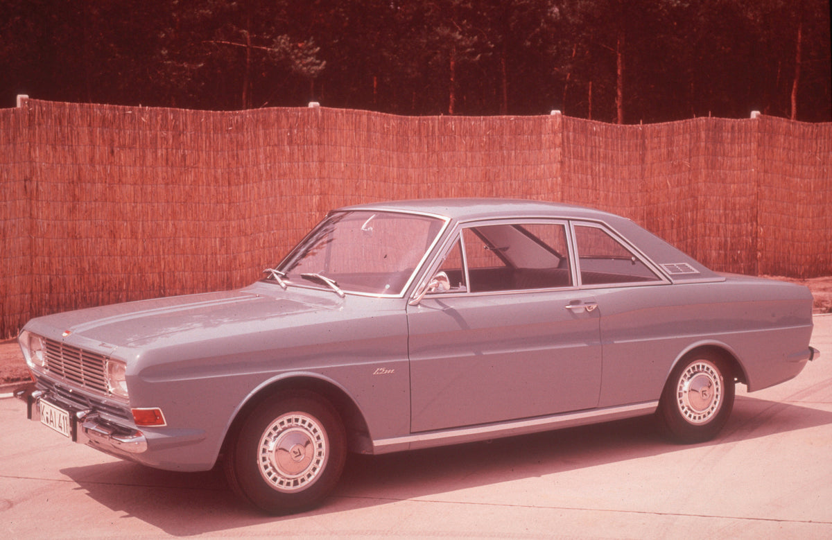 This archival image documents the 1966 Ford Taunus 12M P4 with scenic fence and is preserved in the Ford Heritage Vault as part of Ford Motor Company's historic photographic archive. Free for personal, non-commercial use. Ford Heritage Vault refer...