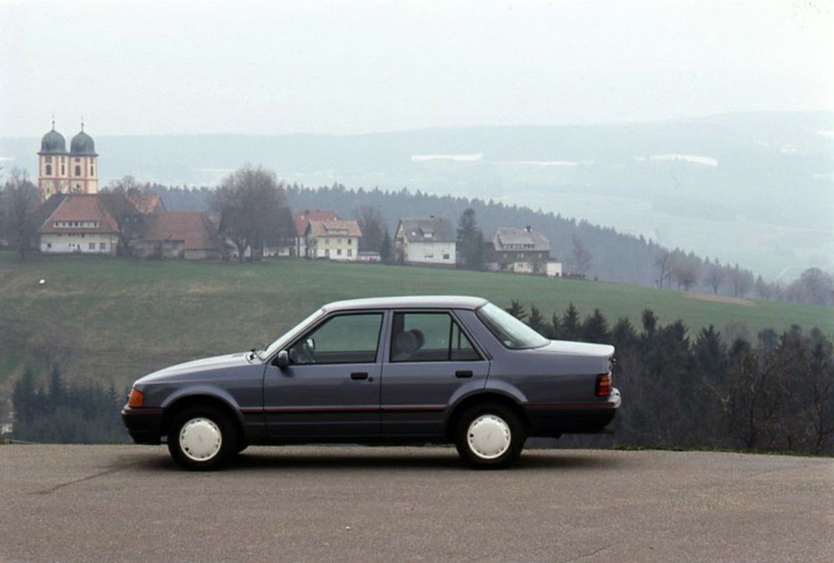 This archival image documents the 1989 Ford Orion Mark II LHD side view with scenic buildings in distance and is preserved in the Ford Heritage Vault as part of Ford Motor Company's historic photographic archive. Free for personal, non-commercial ...
