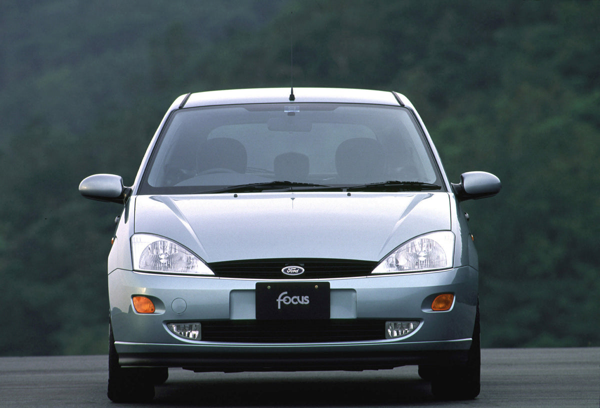 This archival image documents the 2001 Ford Focus Ghia front view with scenic trees MS427 and is preserved in the Ford Heritage Vault as part of Ford Motor Company's historic photographic archive. Free for personal, non-commercial use. Ford Herita...