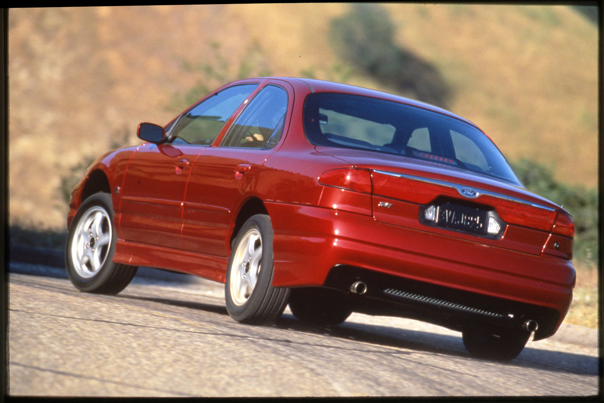 This archival image documents the 1999 Ford SVT Contour and is preserved in the Ford Heritage Vault as part of Ford Motor Company's historic photographic archive. Free for personal, non-commercial use. Ford Heritage Vault reference AR-2008-8.1.2.7...
