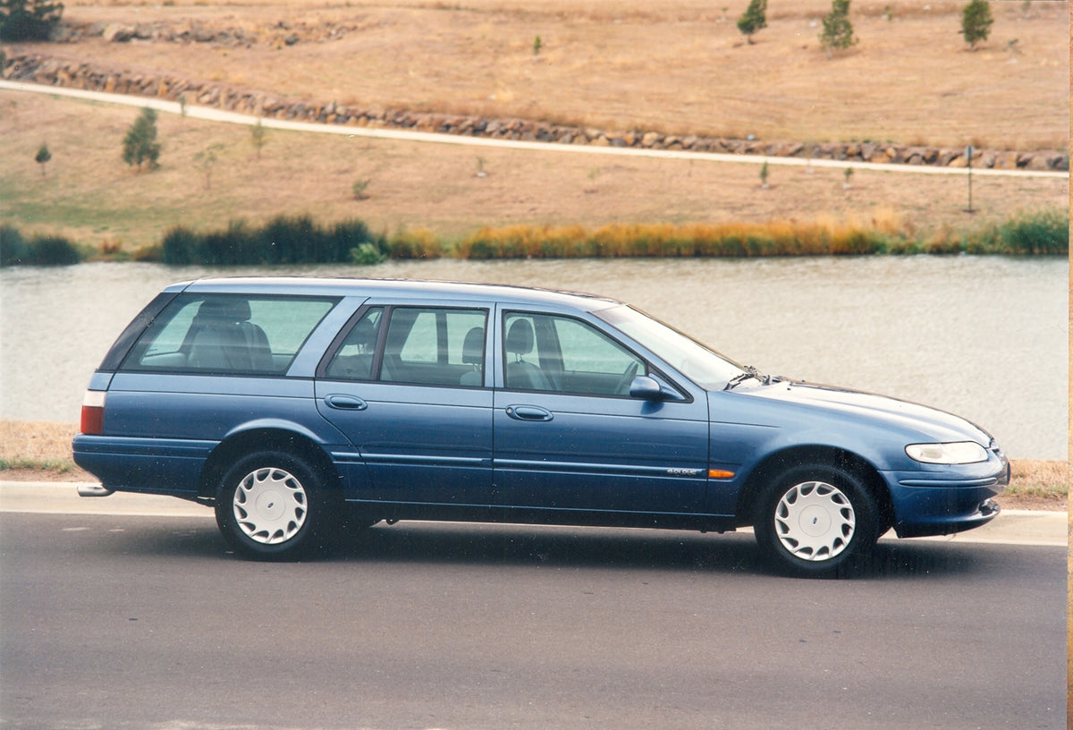This archival image documents the 1997 Ford EL Falcon Station Wagon side view with scenic body of water and is preserved in the Ford Heritage Vault as part of Ford Motor Company's historic photographic archive. Free for personal, non-commercial us...