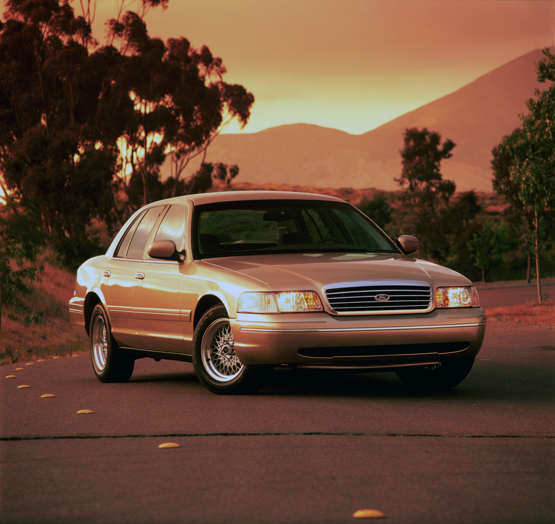 This archival image documents the 1999 Ford Crown Victoria LX and is preserved in the Ford Heritage Vault as part of Ford Motor Company's historic photographic archive. Free for personal, non-commercial use. Ford Heritage Vault reference AR-2008-8...