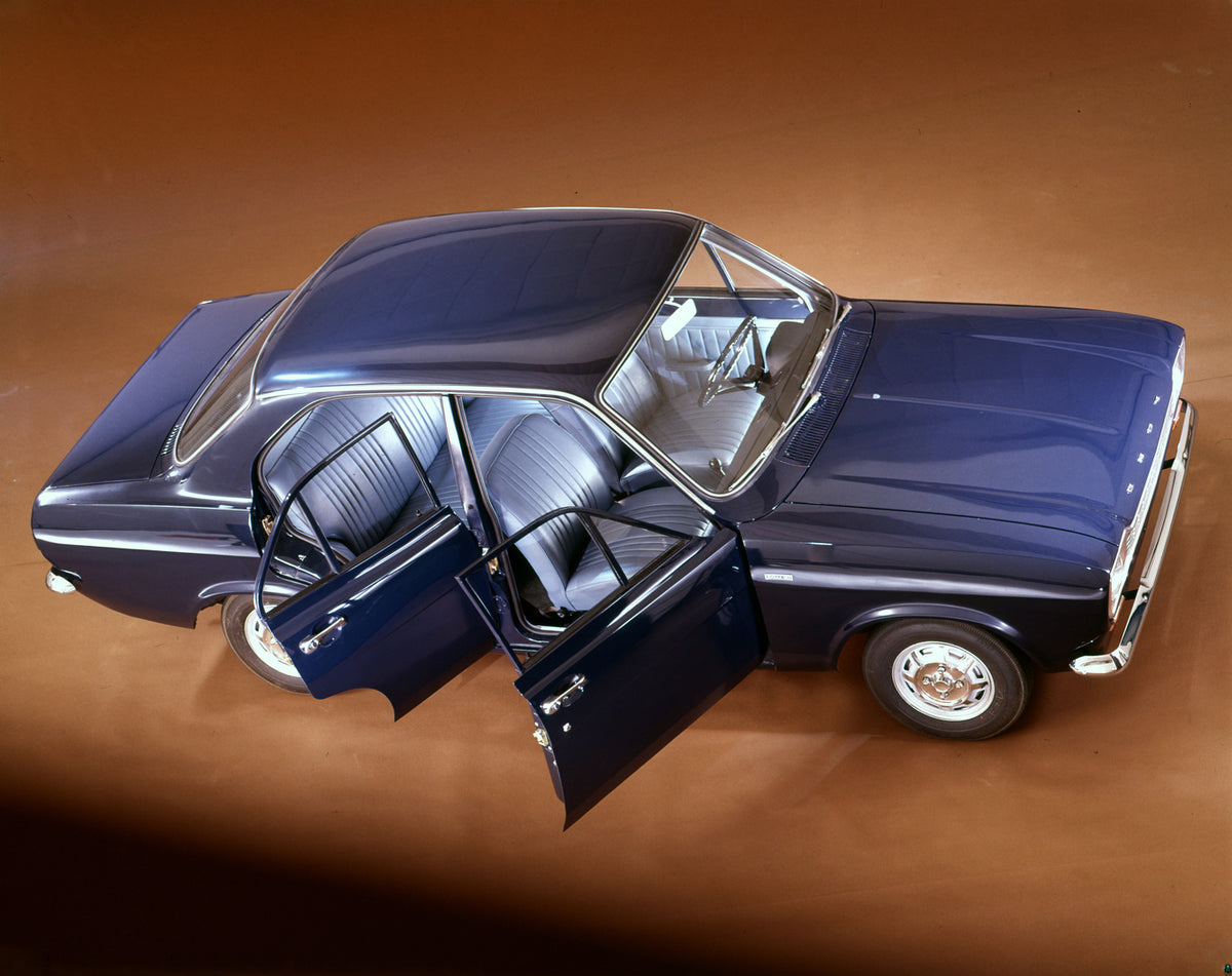 This archival image documents the 1970 Ford Escort Mark I Four Door in studio with open doors and is preserved in the Ford Heritage Vault as part of Ford Motor Company's historic photographic archive. Free for personal, non-commercial use. Ford He...