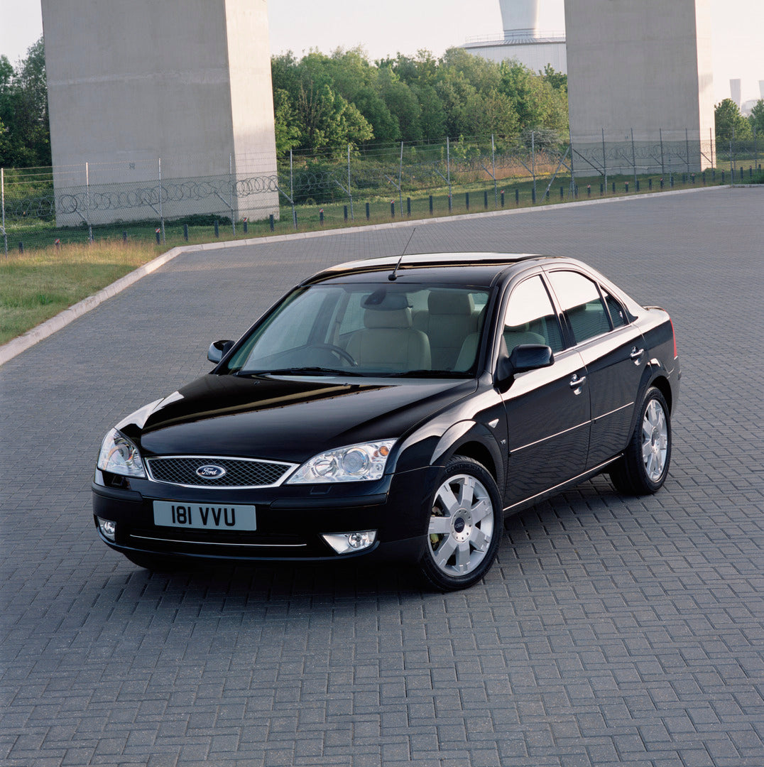 This archival image documents the 2003 Ford Mondeo Mark II on scenic brick pavement and is preserved in the Ford Heritage Vault as part of Ford Motor Company's historic photographic archive. Free for personal, non-commercial use. Ford Heritage Vau...