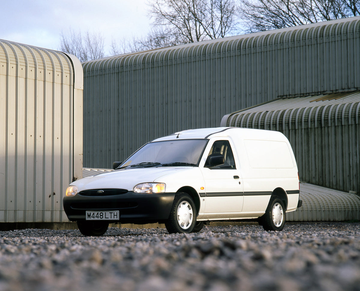 This archival image documents the 1994 Ford Escort Mark V 6/8 Counterweight 95 MY in front of steel building and is preserved in the Ford Heritage Vault as part of Ford Motor Company's historic photographic archive. Free for personal, non-commerci...