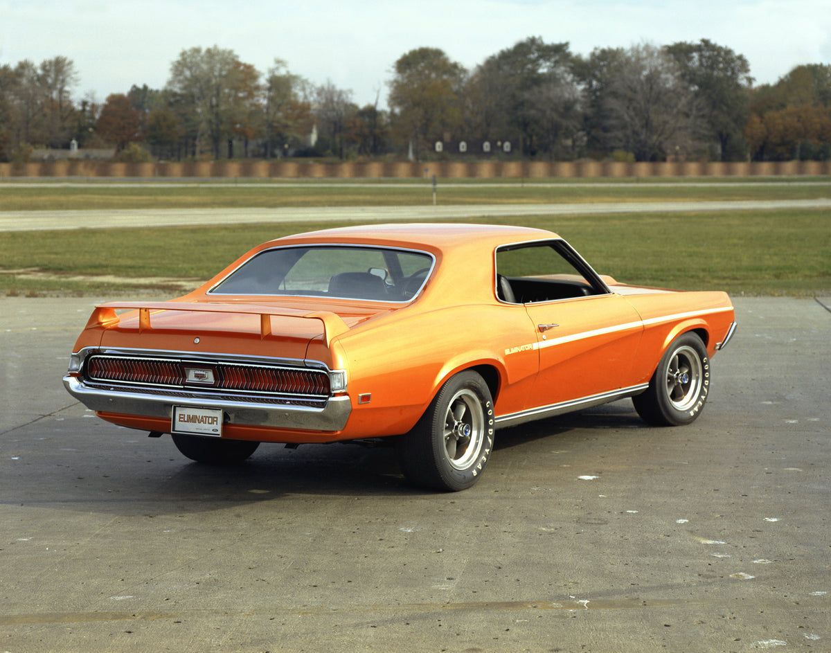 This archival image documents the 1969 Mercury Cougar Eliminator hardtop with Rear Spoiler Rear View and is preserved in the Ford Heritage Vault as part of Ford Motor Company's historic photographic archive. Free for personal, non-commercial use. ...