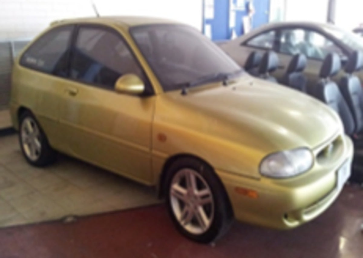 This archival image documents the 1997 Ford Festiva Series II Tri S Hatch Hornet Show Car and is preserved in the Ford Heritage Vault as part of Ford Motor Company's historic photographic archive. Free for personal, non-commercial use. Ford Herita...